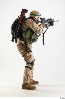  Photos Robert Watson Operator US Navy Seals Pose  1 aiming gun standing crouched whole body 0006.jpg